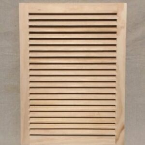 A wooden louvered door with no frame.