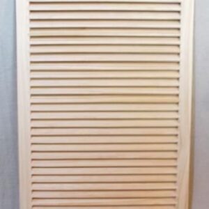 A white door with slats on the side of it.