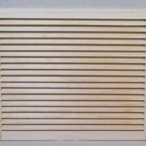 A white shutter with slats on it's sides.