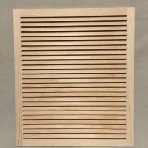 A wooden slat wall hanging on the wall.