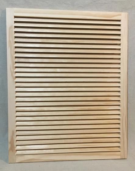 A wooden slat wall with no holes.