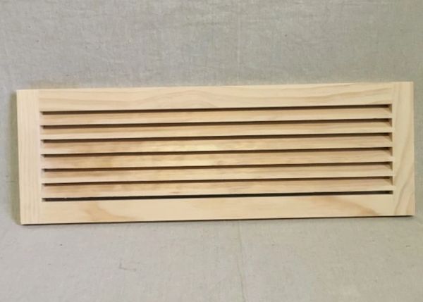 A wooden strip with eight lines on it.
