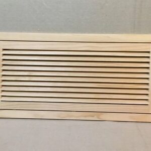 A wooden air vent on the wall