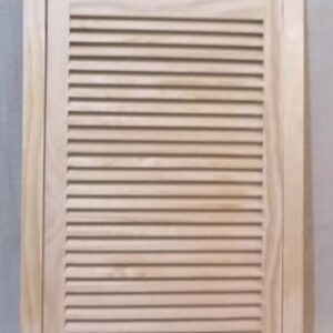 A wooden cabinet with a louvered door.