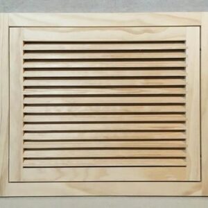 A wooden vent cover on the wall.