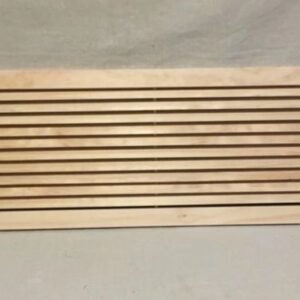 A wooden slat with some lines on it