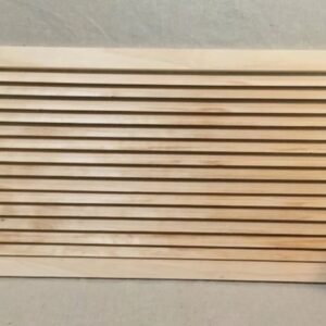 A wooden slat on the wall with a white background