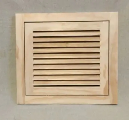 A wooden vent cover on the wall.