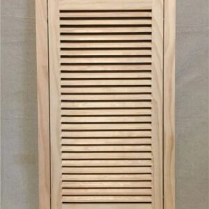 A wooden door with slats on the top and bottom.