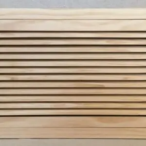 A wooden slat wall with no one in it.