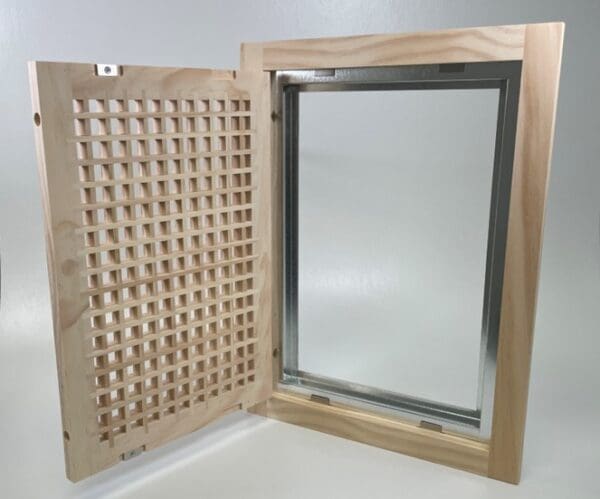 Front perspective view of side hinge Wood Return Egg Crate Filter Grille with door open to show the hinge configuration