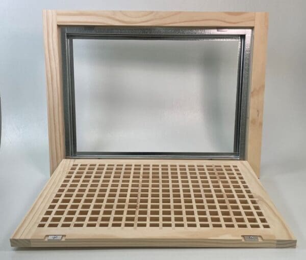 Front perspective view of bottom hinge Wood Return Egg Crate Filter Grille with door open to show the hinge configuration.